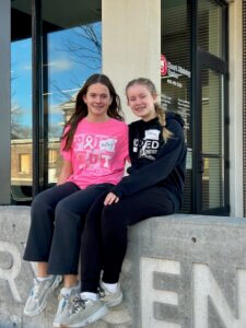 Volunteers sit outside Heart Ministry Center